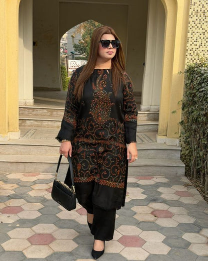 AYLA Deep black pashmina paired with vibrant hand embroidery creates a powerful winter statement. Rich, warm, and exquisitely detailed crafted to perfection for the winter season