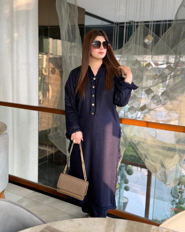 The rich navy tone offers a classic appeal, while subtle thread detailing on the front back daman, front back chaks, sleeves and neckline intricate shinny metal buttons on neckline adds depth without overpowering the design.